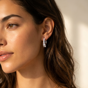 Model wearing silver crystal huggie earring ZSI506-1